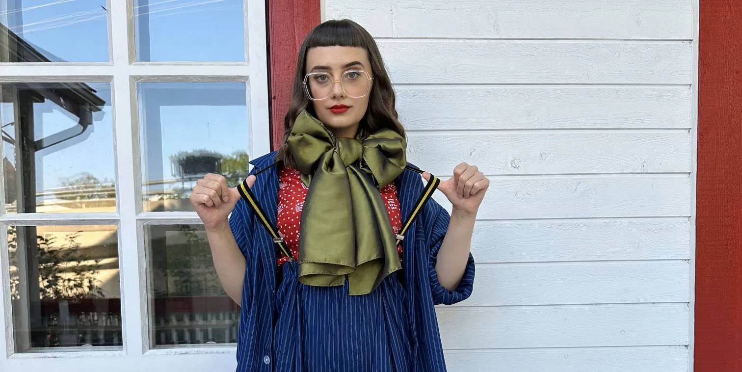 A model in a thrifted outfit, styled for Savers Value Village.