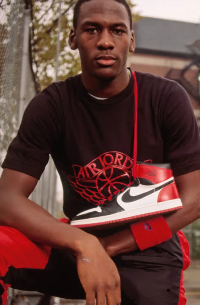 An Air Jordan sneaker in front of an Air Jordan shirt