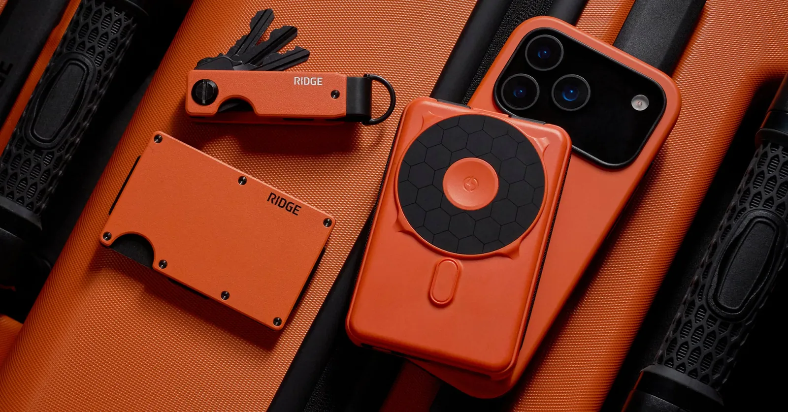 Ridge's own flat-lay product photo of the Wildcat x Ridge wallet, keycase and MagSafe case