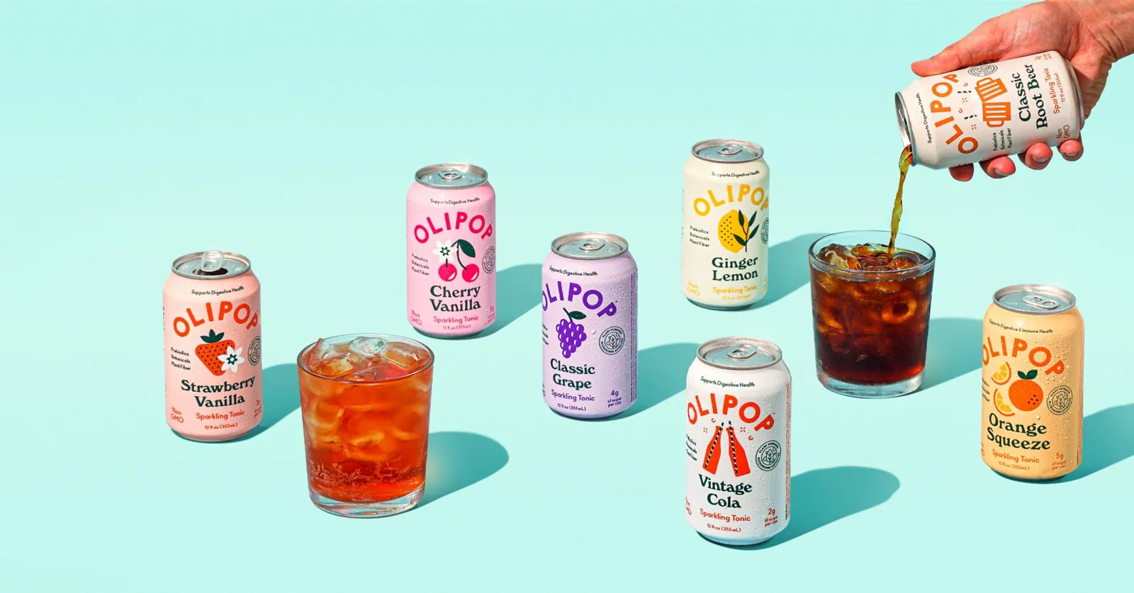 Poppi soda cans and glasses on a blue backdrop