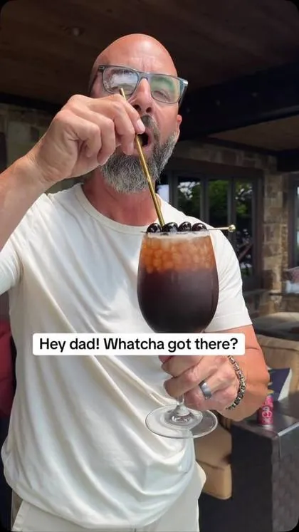a creator's paid Instagram post for OLIPOP, the product in hand