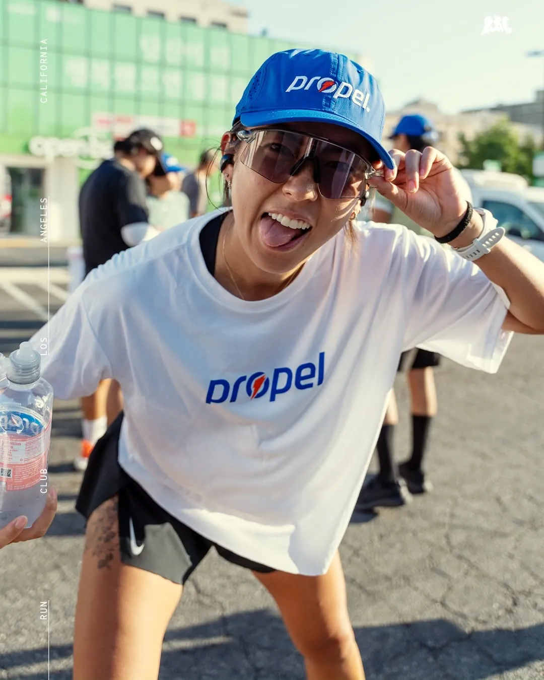 A smiling runner in a race tee