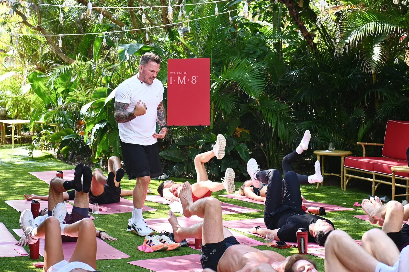 IM8's creator event, ambassadors working out together on a lawn