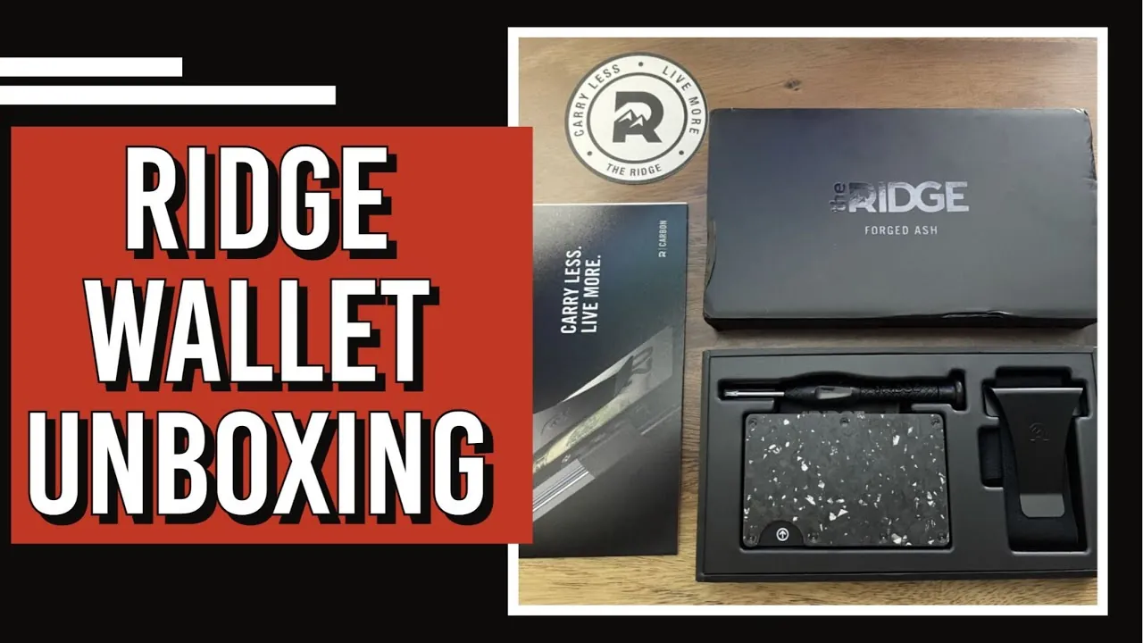a real Ridge PR box opened flat: the wallet, a multitool, a branded card, and the Carry Less. Live More. outer box