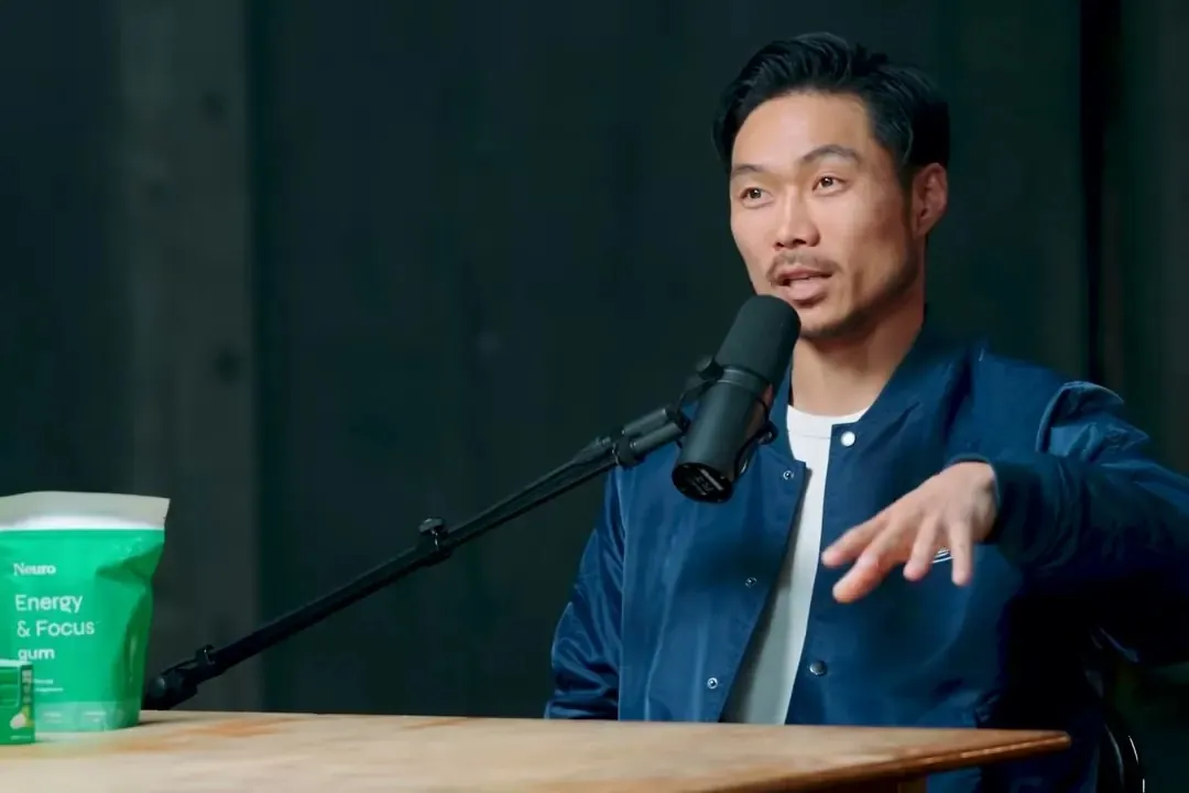 Kent Yoshimura of Neurogum at the podcast microphone, the gum on the table