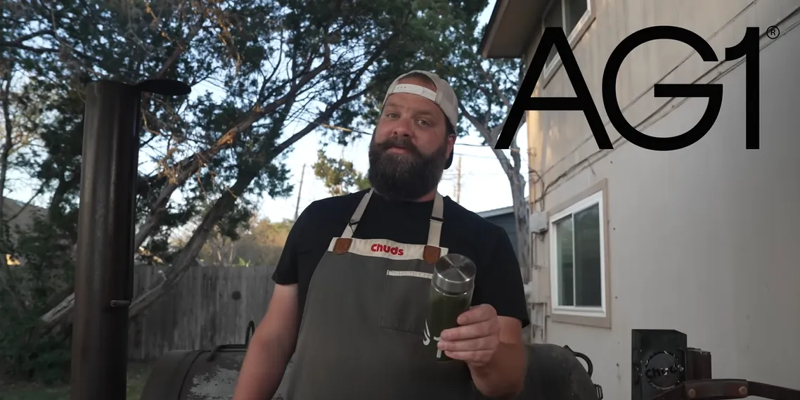 An AG1 sponsored video: a creator showing the product to camera