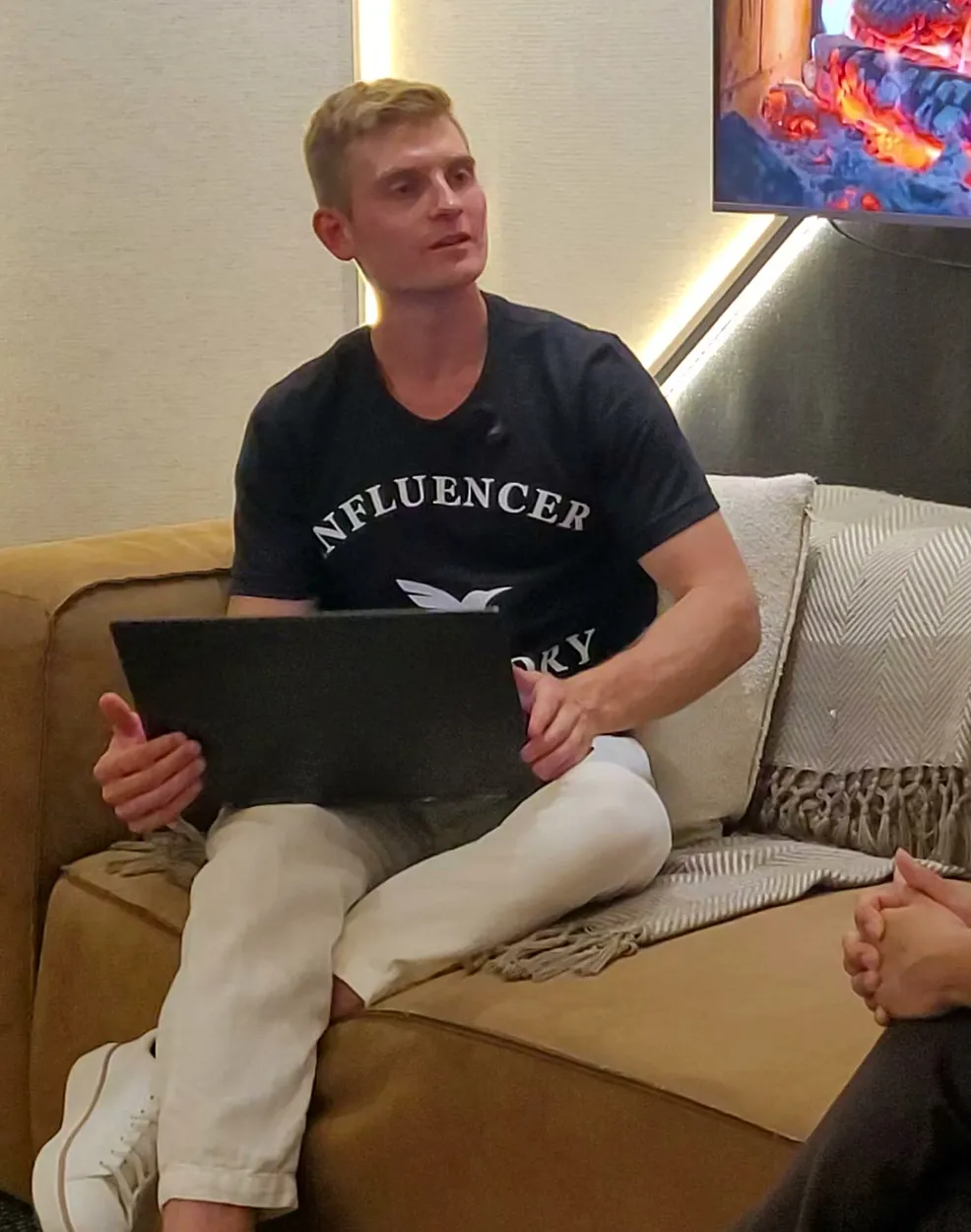 Dennis working on his laptop
