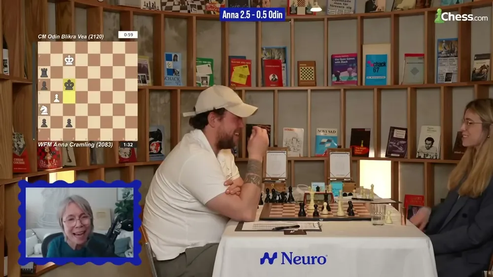 A chess creator&rsquo;s match with the Neuro logo on the table