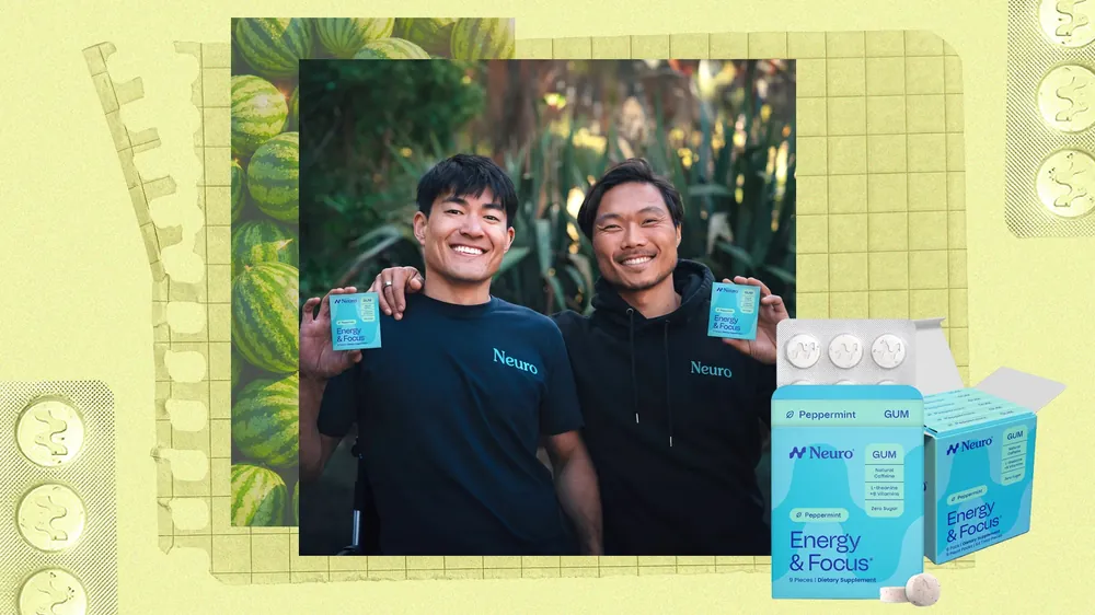 NeuroGum&rsquo;s two founders holding packs of the gum